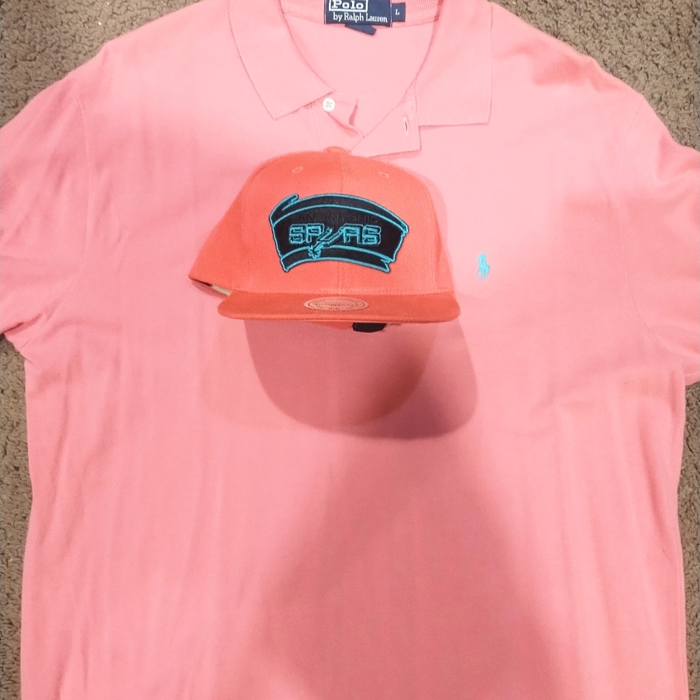 Polo shirt and snapback basketball hat